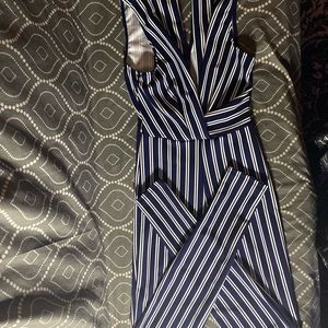 navy blue romper with white and black